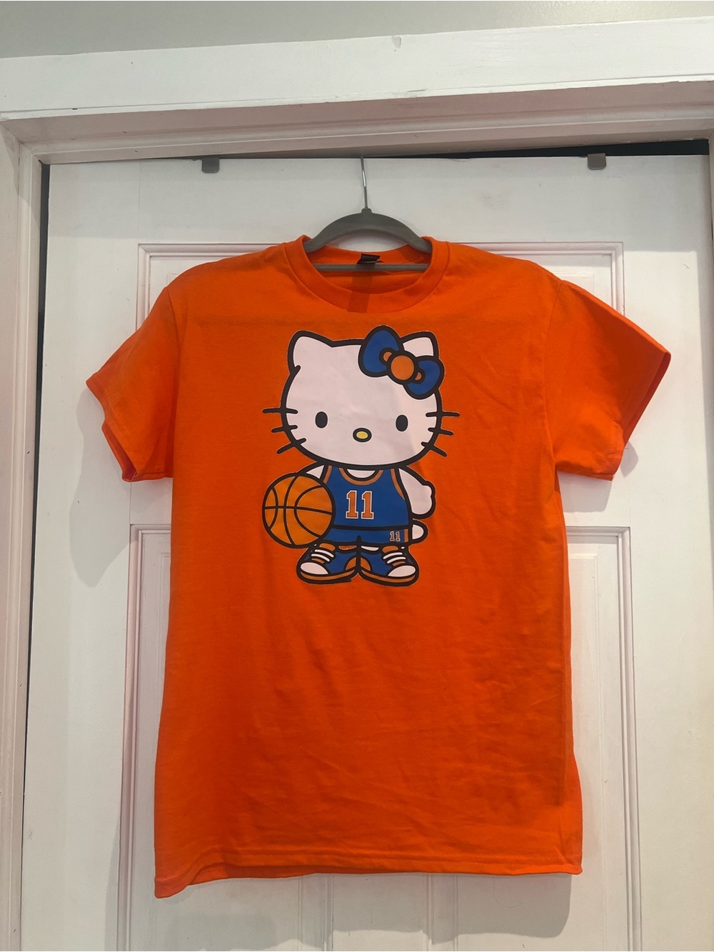 NWOT Orange Hello Kitty Basketball Graphic Tee